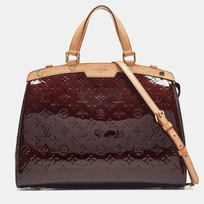 Plus-size satchel with a spacious interior for carrying all essentialsLouis Vuitton Amarante Monogram Vernis Brea Gm Bag..