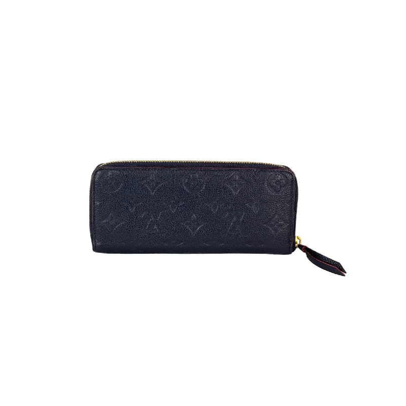 Velvet clutch with a tassel detail for a bohemian - chic styleLOUIS VUITTON Clemence Empreinte Leather Blue Wallet Clutch