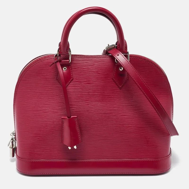 Convertible satchel that can be worn as a crossbody or shoulder bagLouis Vuitton Fuchsia Epi Leather Alma Pm Bag