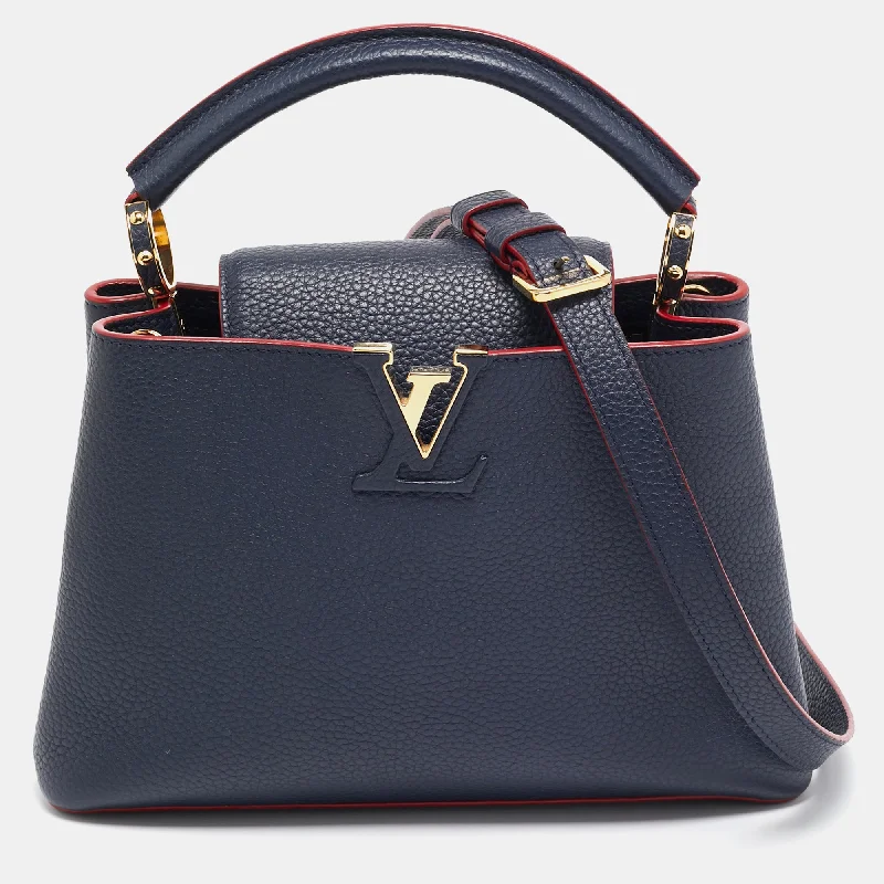 Leatherette satchel with a quilted pattern for a sophisticated styleLouis Vuitton Marine/rouge Taurillon Leather Capucines Bb Bag..