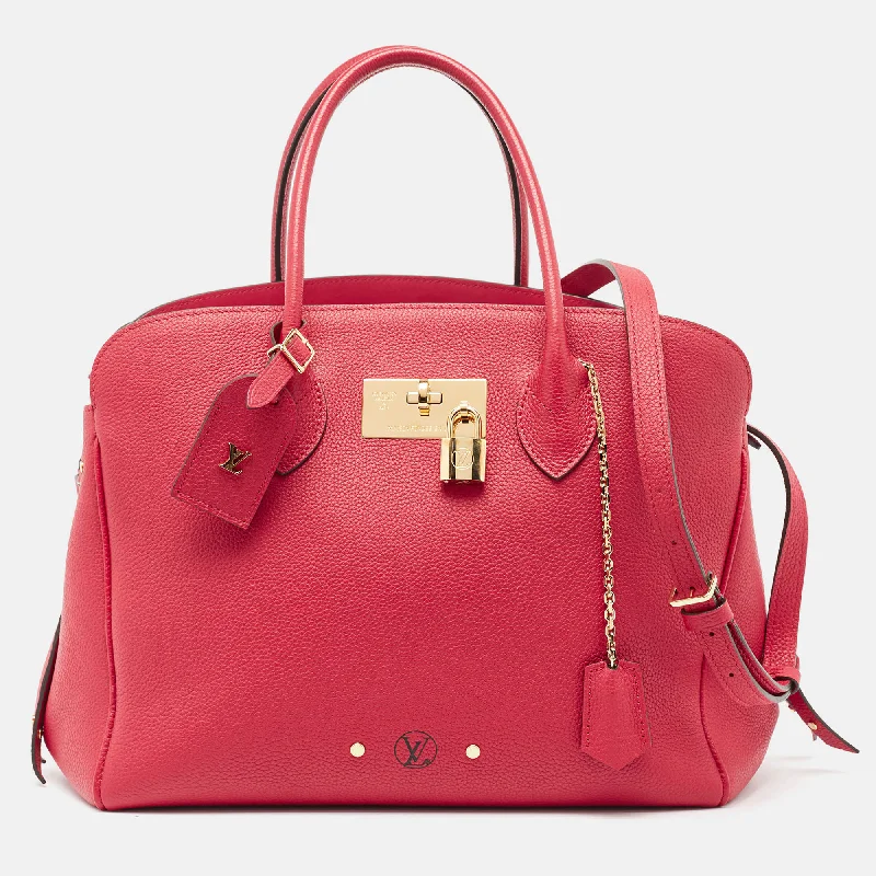 Color-blocked satchel with bold and bright colors for a trendy lookLouis Vuitton Red Leather Milla Mm Bag