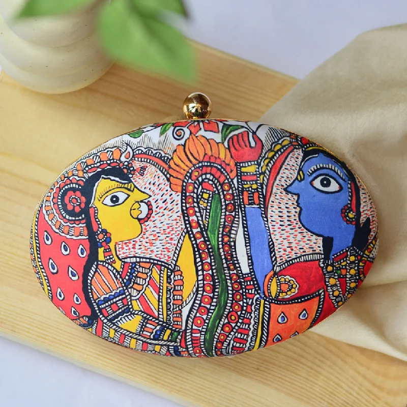 Monogrammed clutch as a personalized evening accessoryMadhubani Print Cutch