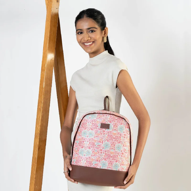 Canvas backpack with a colorful tie - dye pattern for a hippie - chic lookMangalore Blossoms Dome Daypack