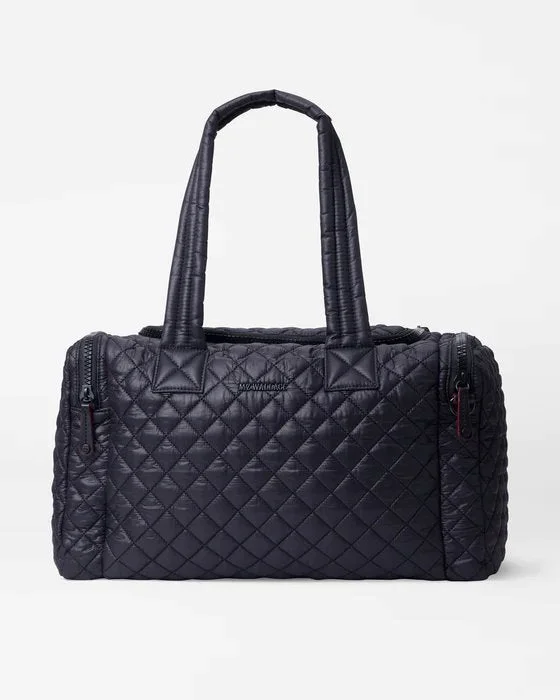 Laser - cut leather handle bag with a geometric pattern for a modern and edgy lookMetro Team Medium Black