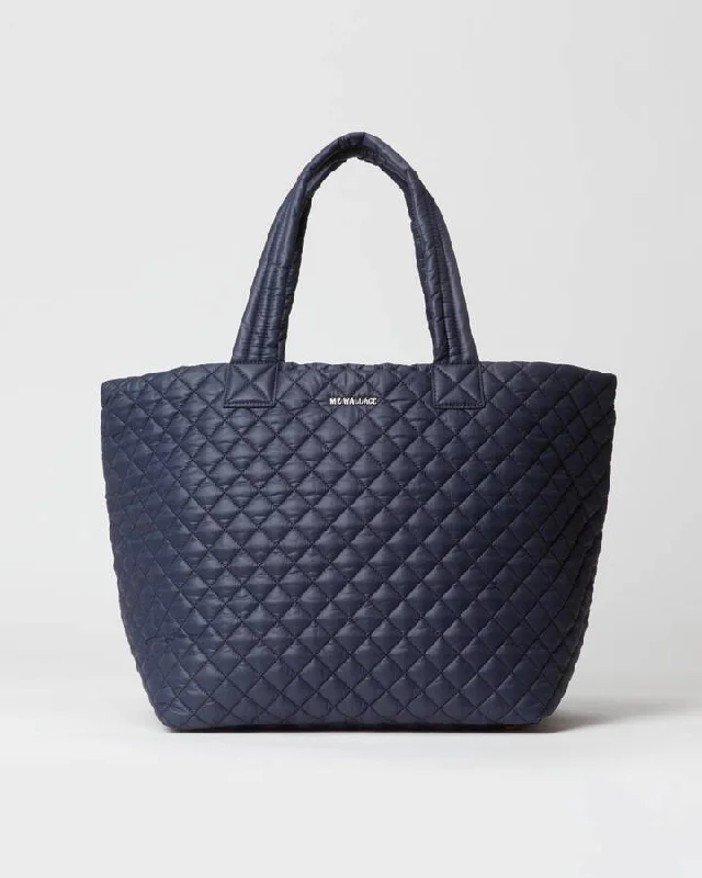 Laser - cut leather handle bag with a geometric pattern for a modern and edgy lookMetro Tote Deluxe Large Dawn