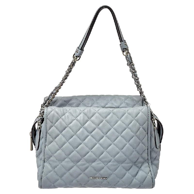 Vintage-inspired satchel with a brass buckle and leather tasselsMichael Michael Kors Quilted Leather Xl Rachel Satchel