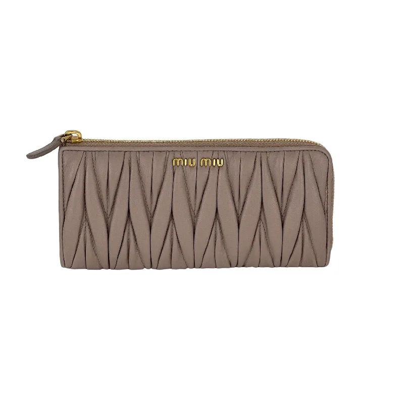 Two - tone clutch with a contrast color lining for added styleMiu Miu Long Beige Zip Around Leather Wallet