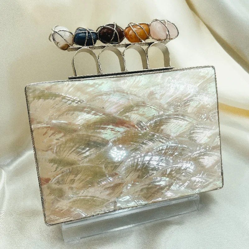 Mother - of - pearl clutch with a delicate sheenMOON Clutch