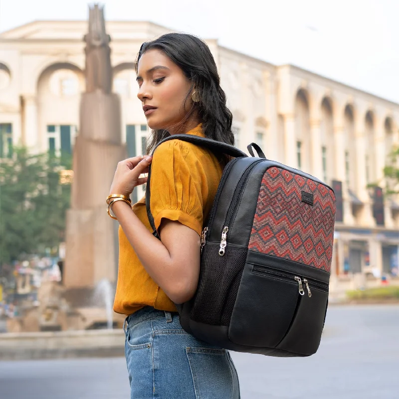 Vintage - inspired leather backpack with a flap - over closure and tassel detailsGwalior Weaves Office Backpack