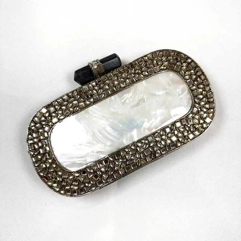 Clutch with a removable strap to be used as a hand - held or cross - bodyNADINE Clutch (Silver)