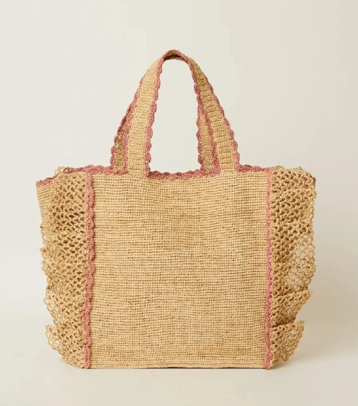 Laser - cut leather handle bag with a geometric pattern for a modern and edgy lookOdesa Tote Natural