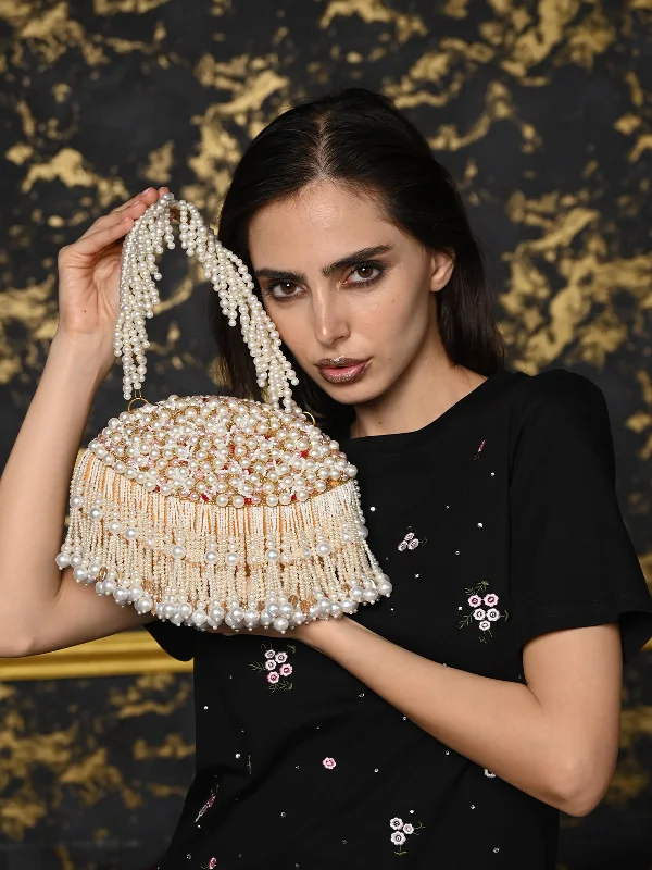 Laser - cut leather evening bag with an intricate patternOdette White Embroidered Clutch With Tassels For Women