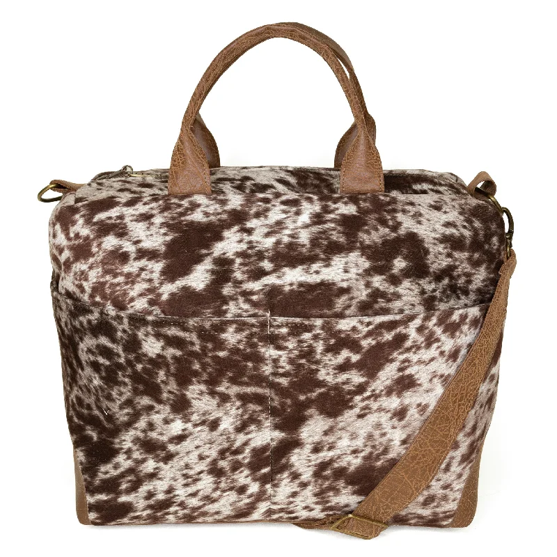 Canvas crossbody bag with a patchwork design for a casual and artsy feelPoppi Pro Premier Purse: Stampede Cowhide