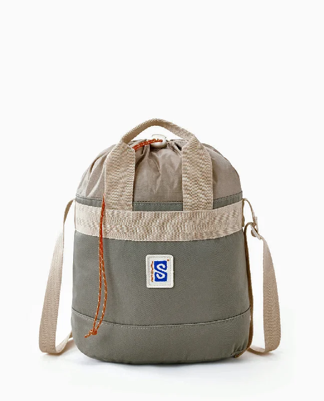 Laser - cut leather backpack with an intricate geometric designSearch Drawstring Bag - Taupe