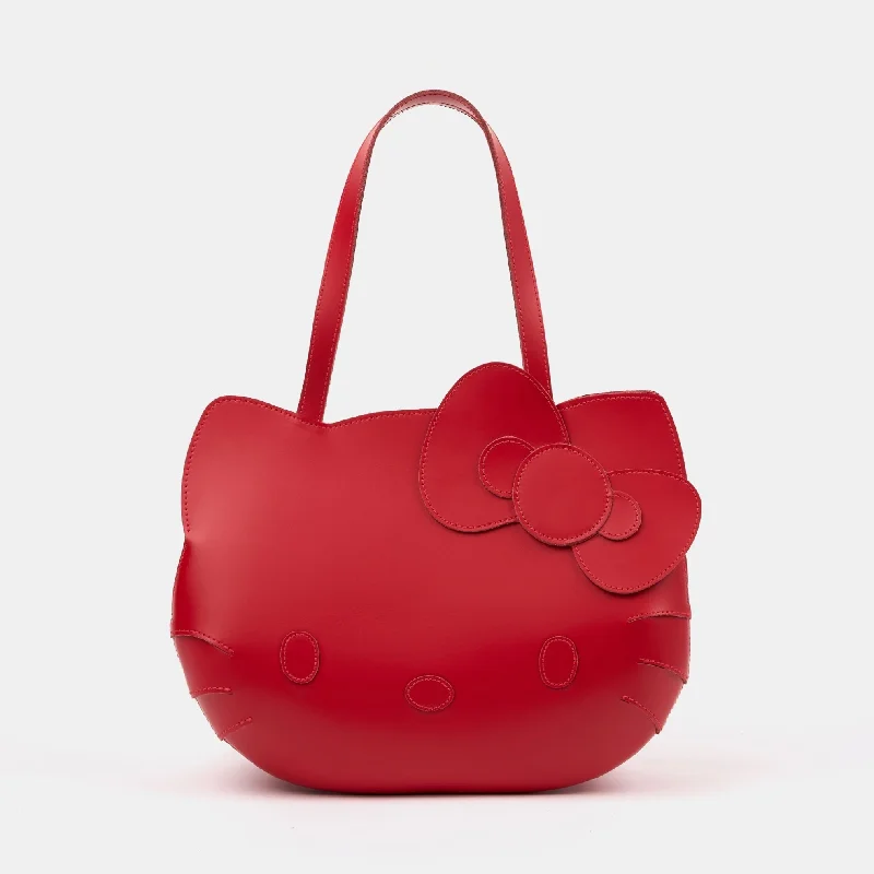 Vintage-inspired satchel with a brass buckle and leather tasselsThe Hello Kitty Face Tote - Red