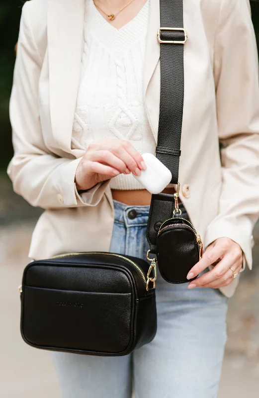 Lightweight nylon crossbody bag with a floral print for spring outingsThe Signature Camera Bag