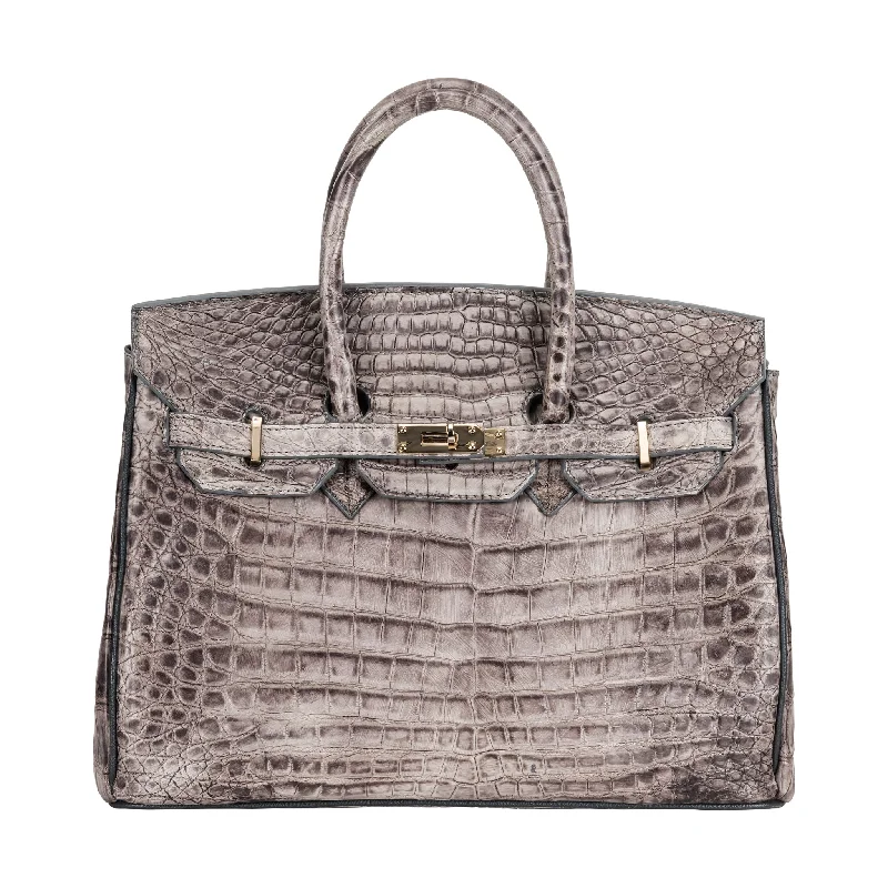 Leatherette handle bag with a quilted diamond pattern and a magnetic snap closureTimeless Exotic Iconic Tote