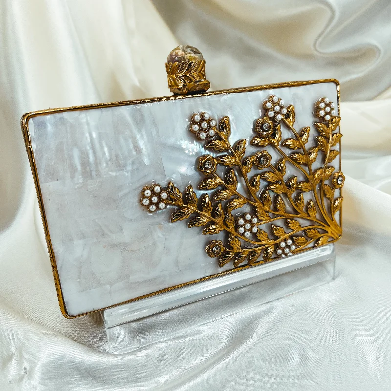 Laser - cut leather evening bag with an intricate patternVEDA Clutch