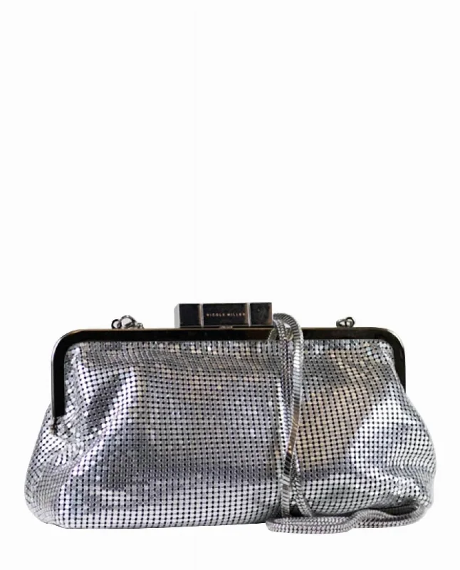 Two - tone clutch with a contrast color lining for added styleWomen's Chainmail Crossbody Clutch In Silver