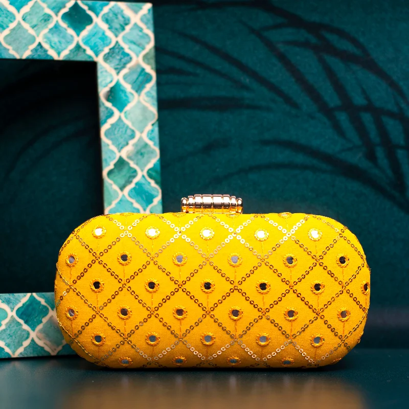 Miniature evening bag with a fold - over clasp for a compact optionYellow Sequins Checks Capsule Clutch