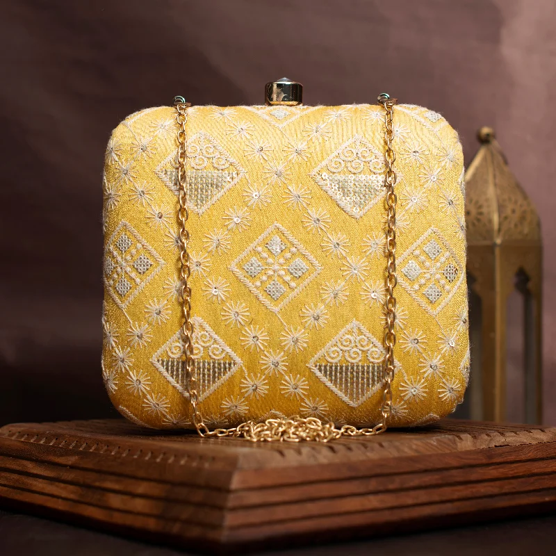 Mother - of - pearl clutch with a delicate sheenYellow Threadwork And Sequins Embroidery Clutch