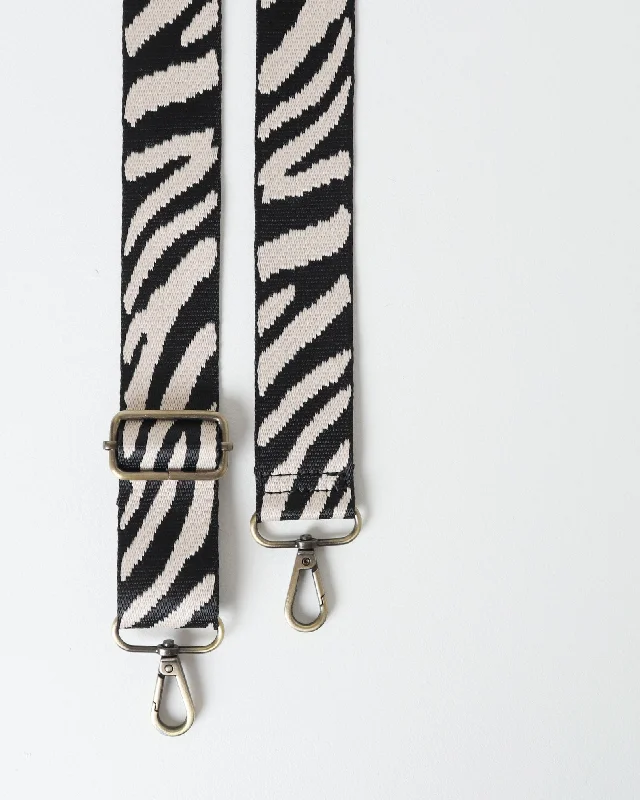 Silk crossbody bag with a delicate print for a feminine touchZebra Webbing Strap