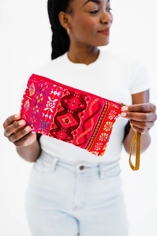 Embroidered silk clutch with a traditional motif for a cultural touchZuri Beaded Clutch